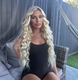 beautiful blonde girl with tape in hair extensions