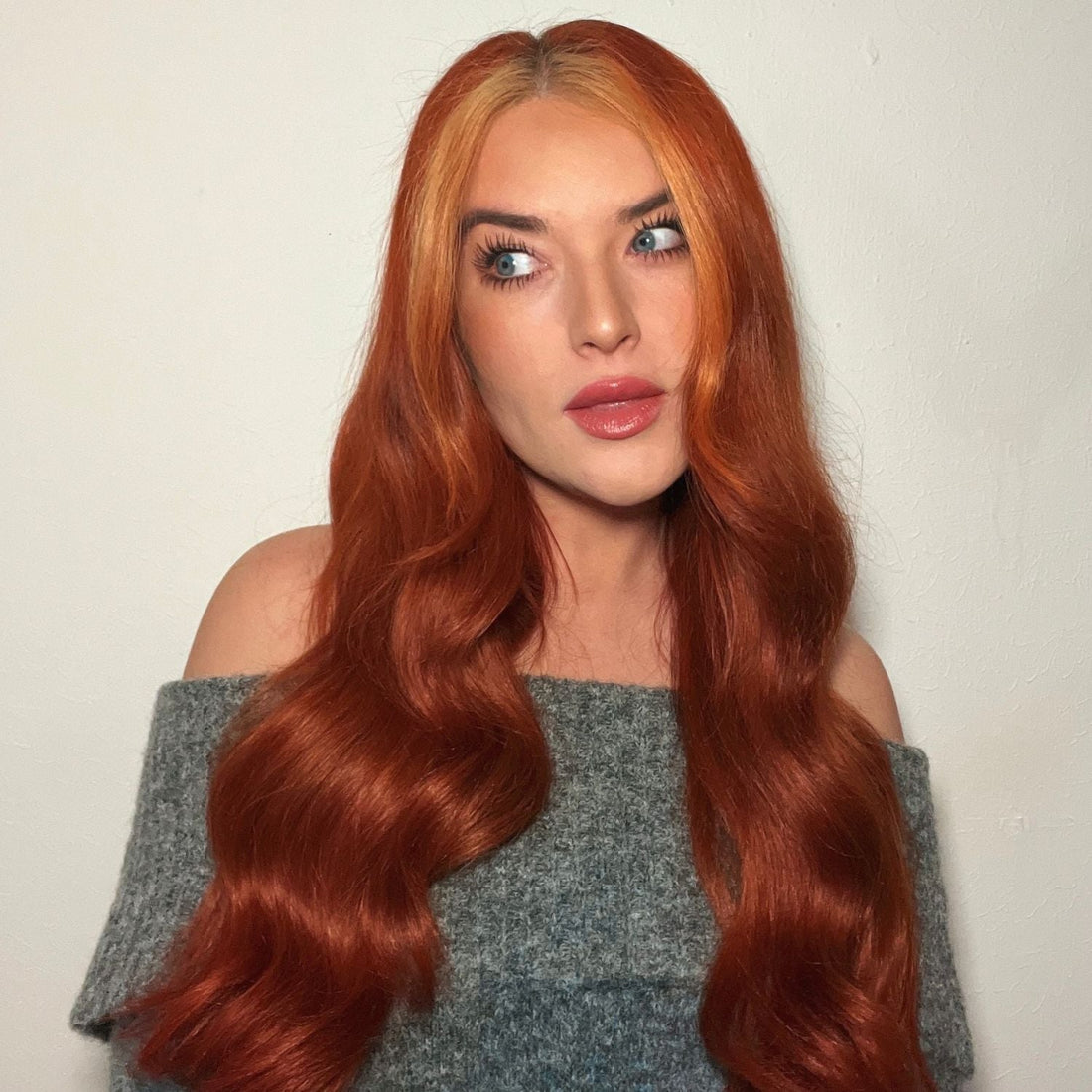 Woman with long auburn coloured hair