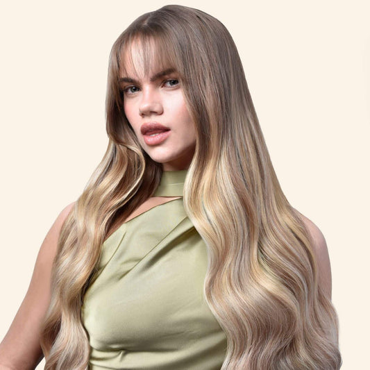 Model wears balayage tape-in extensions 