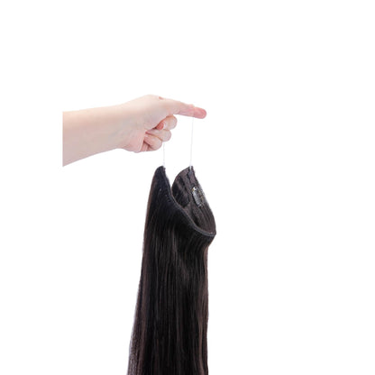 Hand Holding Darkest Brown (#2) Halo Hair Extensions