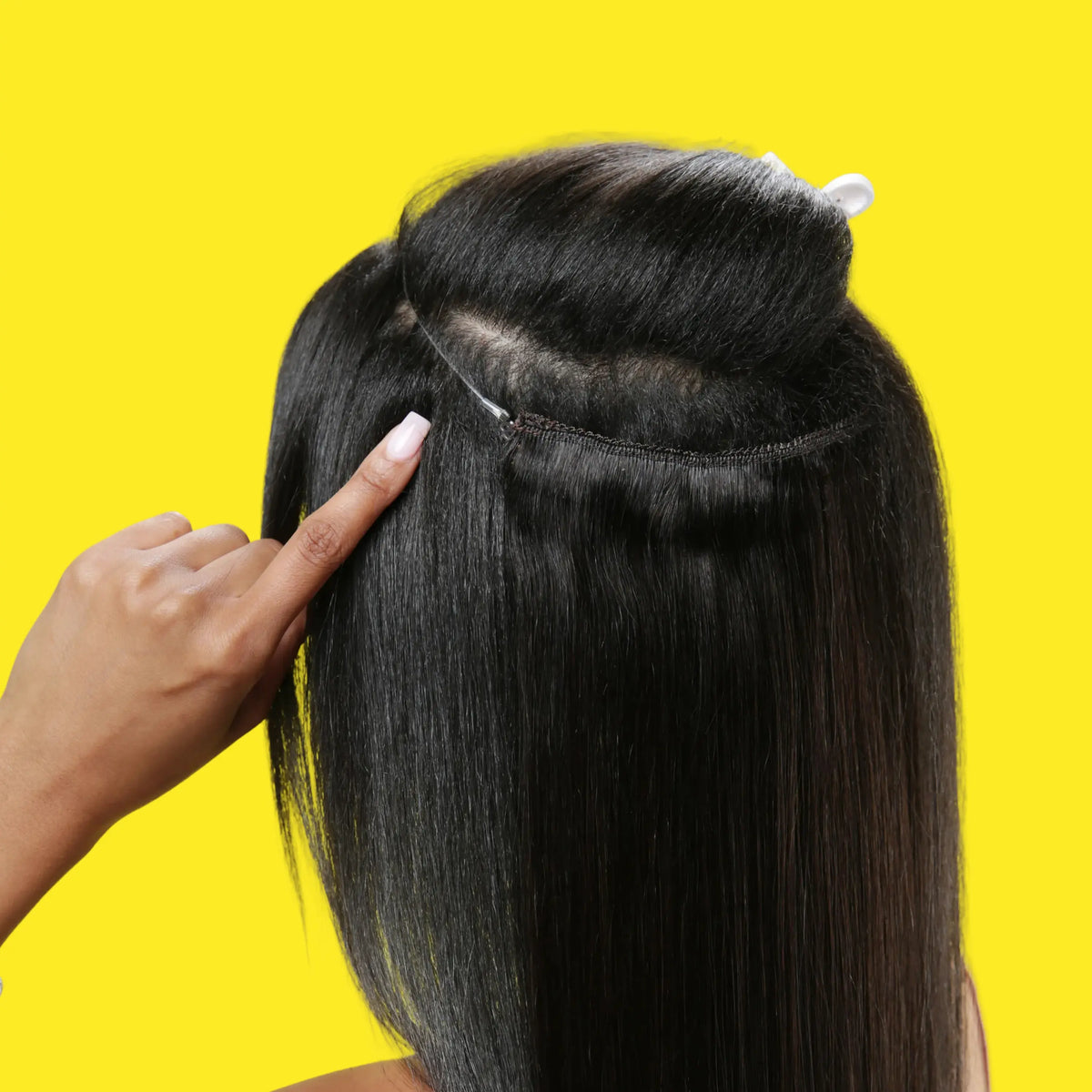 Soft Bronze Balayage Halo Hair Extensions in use