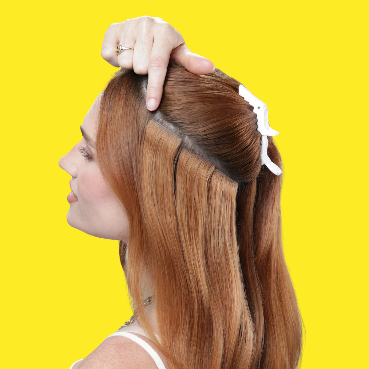 Light Ash Blonde (#22) Remy Royale Invisible Tape In Hair Extensions in use