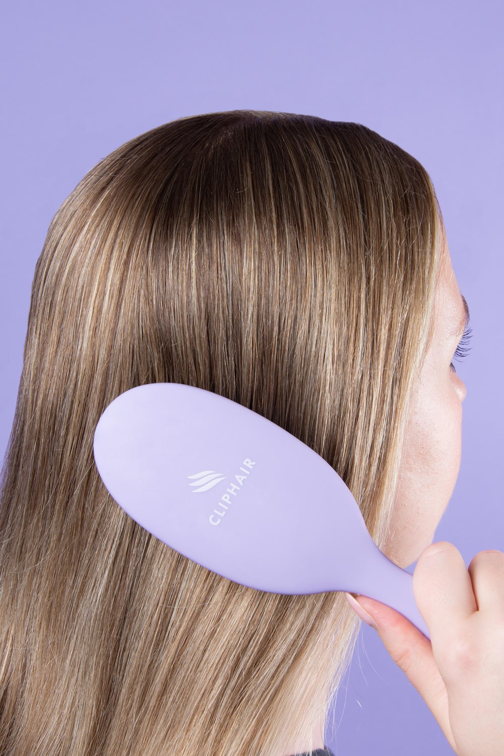 Person using the Bristle Hairbrush