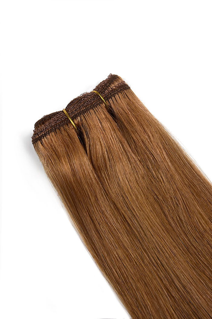 Weft weave hair extensions double drawn hair auburn hair closeup image
